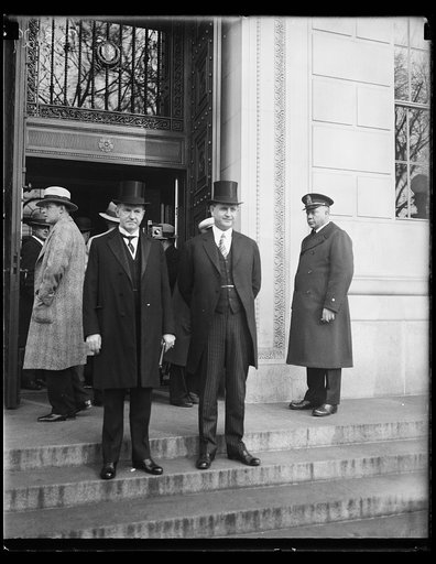 President Coolidge opens International Civil Aeronautics Conference. President Coolidge with his Secretary Everett Sanders snapped as they left the Chamber of Commerce building where the Chief Executive delivered the welcome address at the International Civil Aeronautics Conference