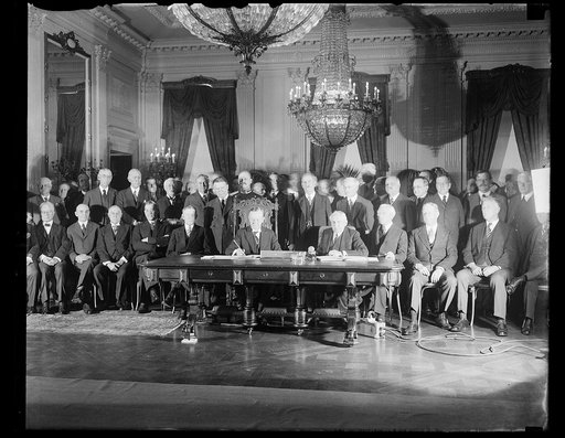 President Coolidge signs Kellogg Treaty. President Coolidge today formally signed the document of ratification of the Kellogg treaty before a distinguished gathering in the east room of the White House, including Vice President Dawes, members of the Cabinet and members of the Senate and House. In th