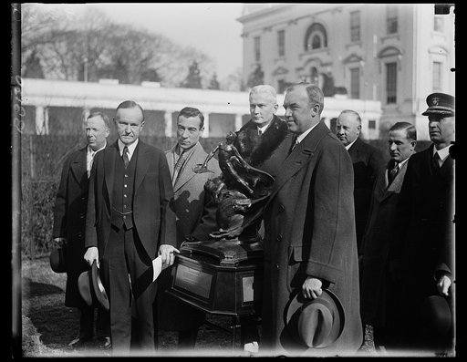 The Collier trophy is awarded to Uncle Sam's Department of Commerce for 1928. The Collier trophy, which is awarded annually by the National Aeronautic Association to the person or organization for the "greatest achievement in aviation in America, the value of which has been demonstrated by actual us
