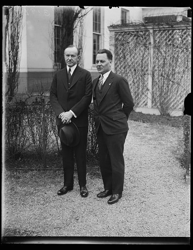 Calvin Coolidge, left; outside White House, Washington, D.C.