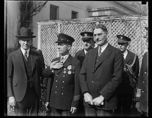 Calvin Coolidge, left, and Curtis Wilbur, right; outside White House, Washington, D.C.