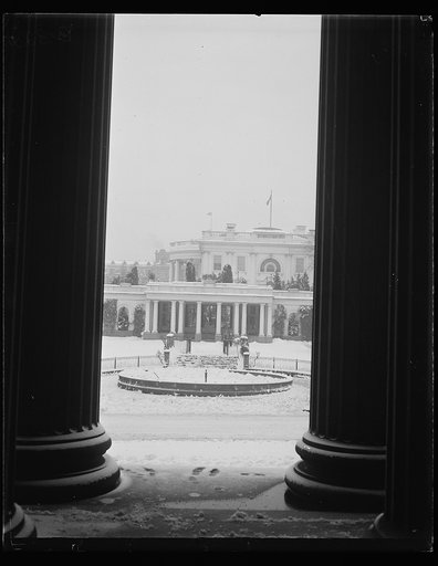 Side view of White House in snow, Washington, D.C.