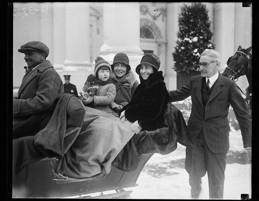 Grace Coolidge in sleigh outside White House, Washington, D.C.