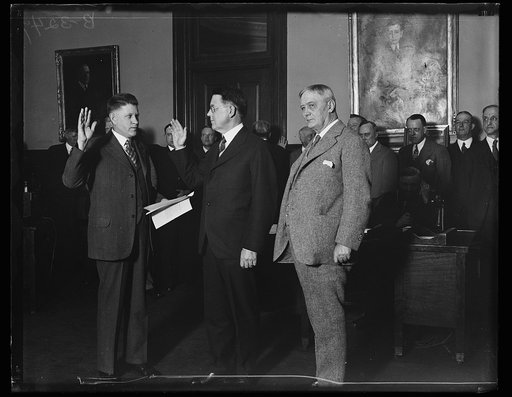 Swearing-in ceremony; Harry S. New, right