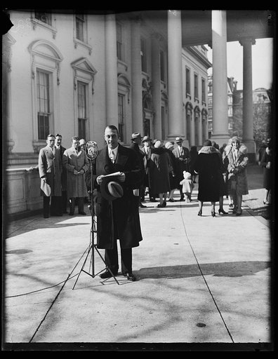 Man standing at NBC microphone outside White House. Washington, D.C.