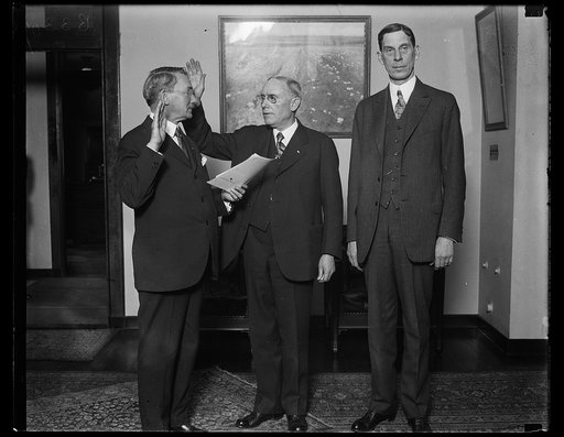 Ray Wilbur, right