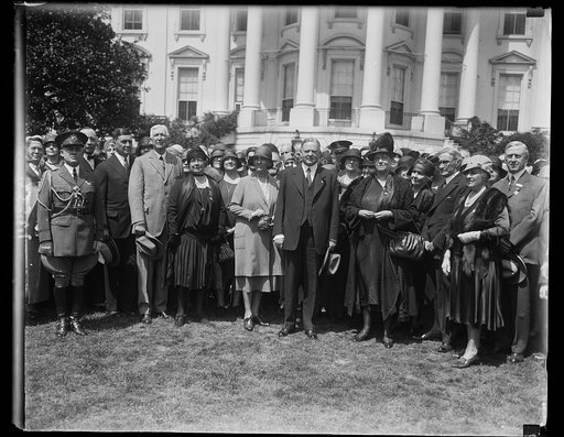 President and Mrs. Hoover receives delegates to eighth annual convention of the American Red Cross, now being held in Washington, were received by President and Mrs. Hoover at the White House today. In the center of group, left to right: Col. Paul Draudt, Germany; Gustavus Pope; Ernest P. Bicknell; 