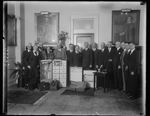 Secretary of Agriculture is surprised with gifts from members of personal staff when he was Governor of Missouri. Led by members of his personal staff when he was Governor of Missouri and fellow Missourians, Secretary of Agriculture Arthur M.Hyde, was given a surprise party at his office in Washingt