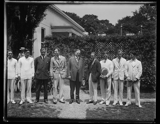 President receives member of American and Japanese Davis Cup teams at White House. Members of the American and Japanese Davis Cup teams, who competing in Washington, were received by President Hoover at the White House today. Left to right: (center) John Hennessey of U.S. Team; President Hoover; and