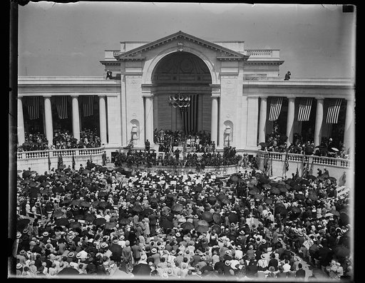 Scene at Arlington National Cemetary where thousands gathered to pay tribute to America's war dead. General view at Arlington National Cemetary today, Memorial Day, where thousands gathered to hear President Hoover make the principal address in paying tribute to the dead of American heroes of 4 wars