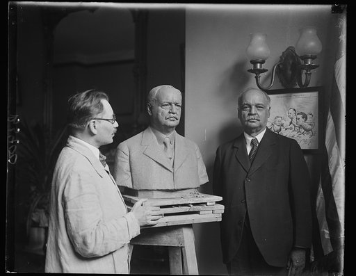 Moses Dykkar sculptor with bust of Curtis (V.P.)