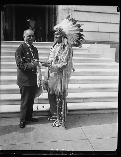Vice President Curtis receives peace pipe from Chief Red Tomahawk, slayer of Sitting Bull. Chief Red Tomahawk, leader of the Sioux Nation and credited with having killed Sitting Bull, presented Vice President Curtis with a peace pipe at the United States Capitol today. Chief Red Tomahawk, who is 80 