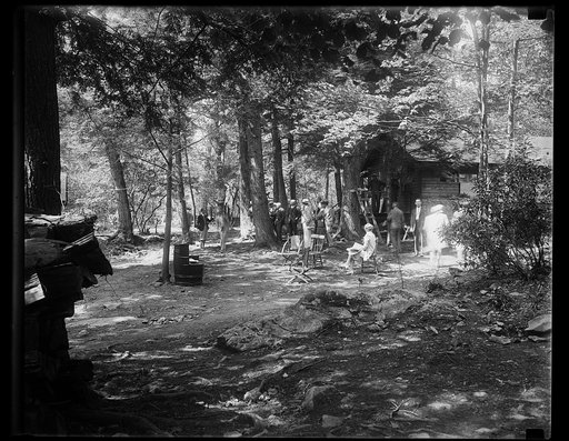Group at cabin in forest