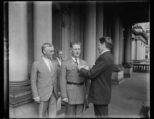United States rifle champion receives medal from Assistant Secretary of War. The Assistant Secretary of War, Col. Patrick J. Hurley, who is also president of the National Rifle Association, pinning on Sergeant Jens. B. Jenson, Troop "A", 7th Calvary, the medal for the National Individual Rifle Match