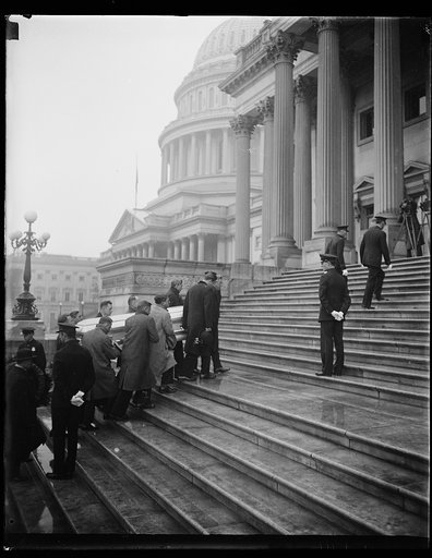 Body of late Senator Burton arriving at Capitol to lie in state. President Hoover with other high officials of the Government attended the funeral services for the late Senator Theodore E. Hurton of Ohio, which were held in the Senate Chamber of the United States Capitol today. The picture shows the