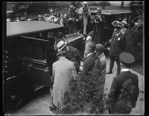 Former Secretary of Interior found guilty of bribery. Albert B. Fall, former Secretary of Interior, leaving the District and Supreme Court in Washington today surrounded by members of his family, after he was found guilty by a jury of accepting a bribe of $100,000 from E.L. Dohency. The jury was out