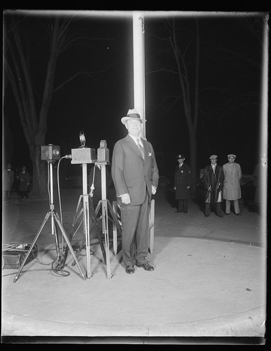 Into the open. Harry F. Sinclair, millionaire oil magnate faced a battery of cameras and flash guns as he stepped, a free man, from the District Jail, shortly after midnight, last night