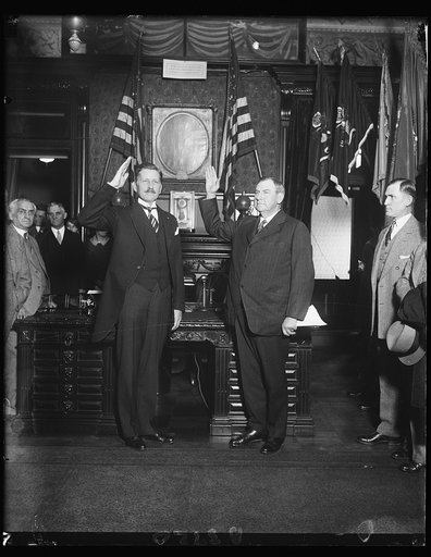 Patrick J. Hurley takes oath of office as Secretary of War to succeed late James V. Good. Justice Harland Fiske Stone (right) Associate Justice of the United States Supreme Court, administering the oath of office to Patrick J. Hurley of Oklahoma, who succeeds the late James V. Good as Secretary of W