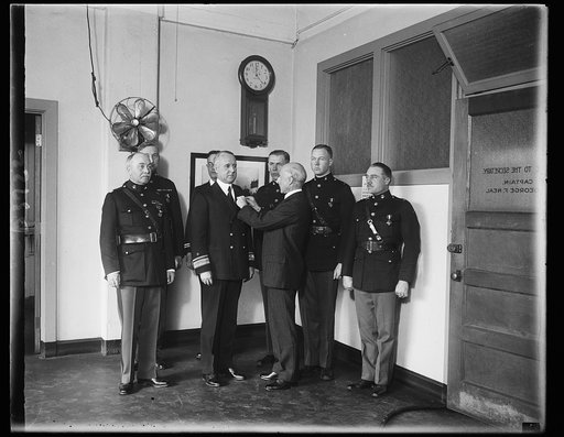 Heroes of Nicaraguan service receive decorations from Secretary of Navy. Seven officers of the United States Navy and Marine Corps were presented with decorations for distinguished service in Nicaragua by Secretary of the Navy Charles Francis Adams today at the Navy Department. In this picture Secre