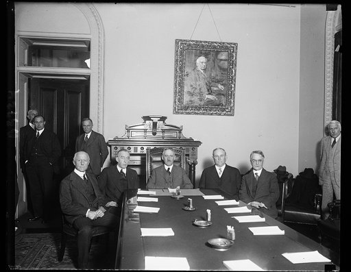 American delgates to Naval arms parley meet in Washington at State Department. The American delegates to the Naval arms parley to be held in London in January met at the State Department in Washington today. In the phottograph, left to right: Secretary of the Navy Charles Francis Adams; United State