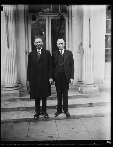 Successor to late Senator Warren of Wyoming calls on President Hoover. Senator Patrick J. Sullivan (left) who was appointed by the Governor of Wyoming to fill the unexpired term of the late Senator Francis E. Warren, was presented to President Hoover today by Claudius Huston, (right) Chairman of the