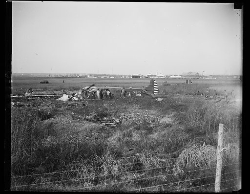 Five persons lose lives in plane crash at Nation's Capital. Scene at Bolling Field, Washington, today shortly after a huge Army plane crashed from a 300-foot altitude claiming the lives of five people, including that of a congressman, his secretary, and a famous Army pilot. The dead are: Rep. Willia