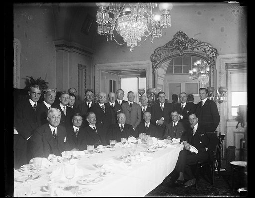 Given luncheon at Capitol. The Senate Foreign Relations Committee today tendered a luncheon to General Jan Christian Smuts, former premier of South Africa. Seated in the center of the group: Senator Claude A. Swanson, General Smuts, Eric H. Low, South African Minister to the United States, Senator R