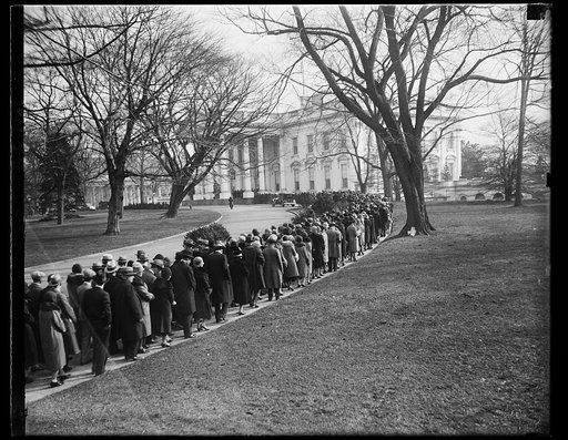 General public arrives. After the Diplomatic Corps, the Army and Navy, etc., general public lined up to greet the President and Mrs. Hoover at the annual White House New Year's Reception