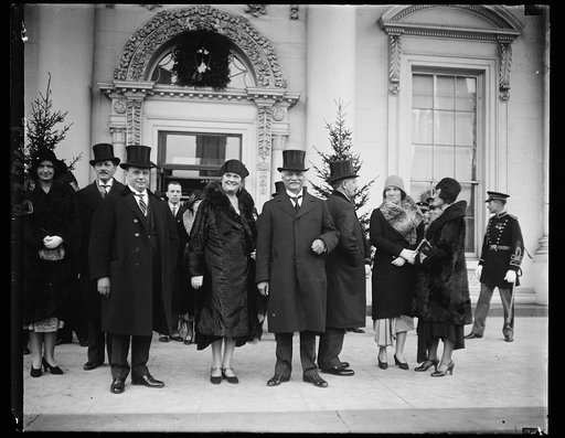 New Years Day at the White House. Mr. Gann, Mrs. Gann (sister of the vice president) and Vice President Curtis, as they left the New Year's reception at the White House