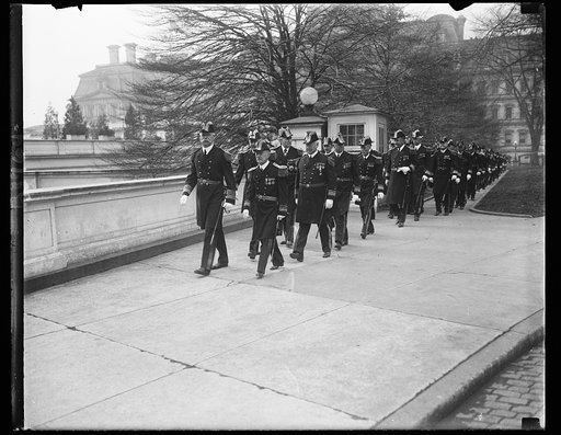 The Navy at the White House. Officers of the United States Navy arriving at the White House for annual New Year's Reception. In the lead, Admiral Charles F. Hughes, chief of Naval operations and Admiral T.J. Cowie (retired) former Paymaster General