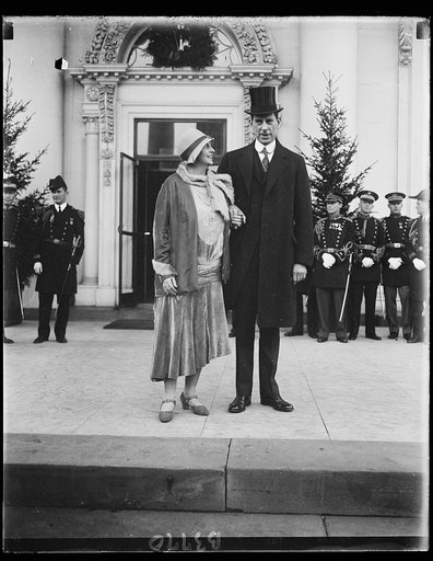 Secretary of the Interior and Mrs. Ray Lyman Wilbur as they appeared at the White House for the New Years reception