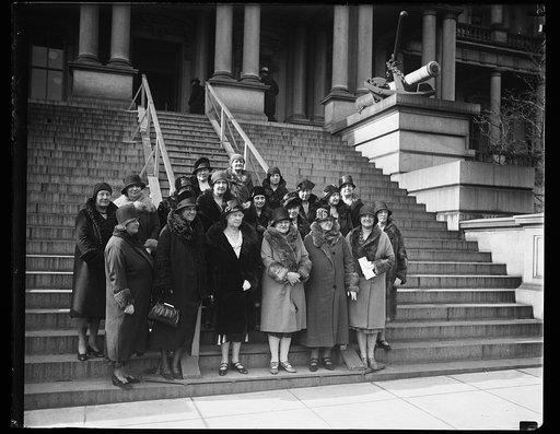 Call on Hoover. Members attending the Fifth Annual Conference on the Cause and Cure of War call on President Hoover. Here they are photographed after the meeting on the steps of the State, War, and Navy building. Left to right, front row: Miss Ruth Morgan, NY, Mrs. Edgerton Parsons, NY, Mrs. Ben Hoo