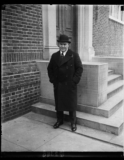 New Georgetown Coach. Tom Mills, new Georgetown University Football Coach, snapped as he arrived at the Hilltop today to assume his newly acquired duties. Mills, who succeeds Lou Little, was an Assistant Coach under [...] at Notre Dame