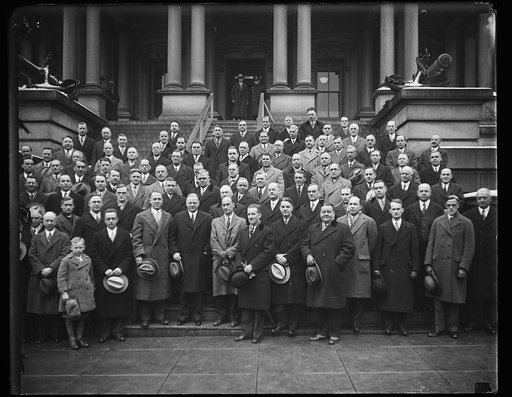 Herbert Hoover and group in front of State, War and Navy Building, Washington, D.C.