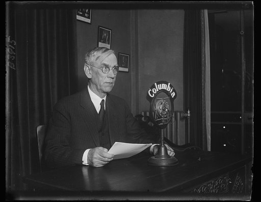 Senator Reed Smoot explains Tariff Bill over the radio. The Tariff Bill which has just been passed by the Senate was explained over the radio last night by Senator Reed Smoot of Utah, Chairman of the Senate Finance Committee. The speech was sent over the Columbia Broadcasting System network from WMA