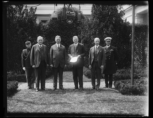 Group, including Henry Stimson, 3rd from left, Herbert Hoover, center, and Charles Adams, 2nd from right