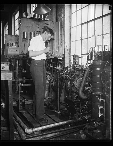 Government expert listens to broadcasts of automobile [...] The Automotive Section of the Bureau of Standards is studying the anti-knock proportion of fuel used in automobile and aircraft engines and the scientist in this photograph is "listening in" to the signals of an engine instead of listening 