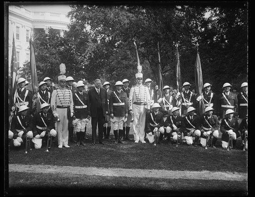Herbert Hoover with marching band outside White House, Washington, D.C.