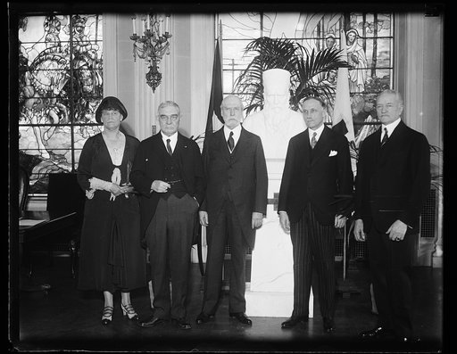 Group: Charles Evans Hughes, center; John J. Pershing, right
