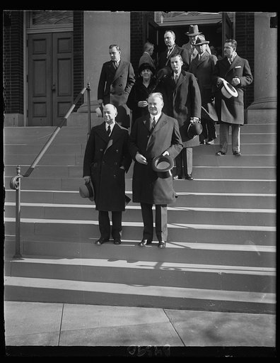 Pres. Hoover, Rev. Taylor, Mrs. Hoover, and Allen Hoover leaving church. Thanksgiving service