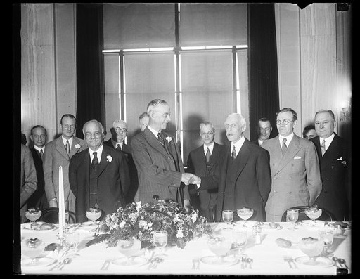Charles Curtis, center left, and Andrew W. Mellon, center right
