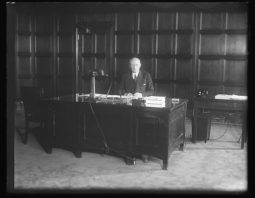 Robert P. Lamont at desk