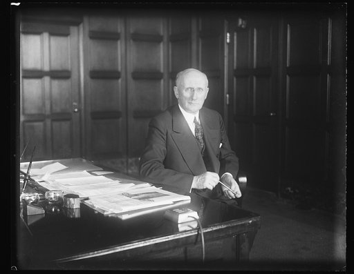 Robert P. Lamont at desk