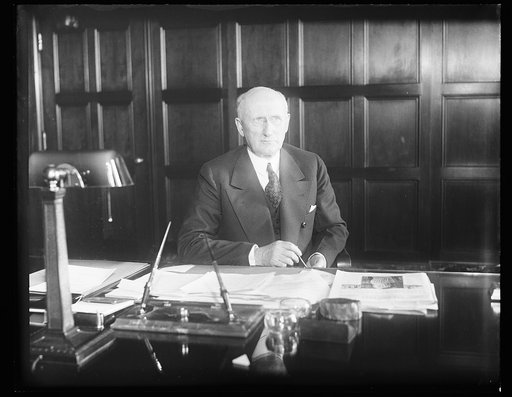 Robert P. Lamont at desk