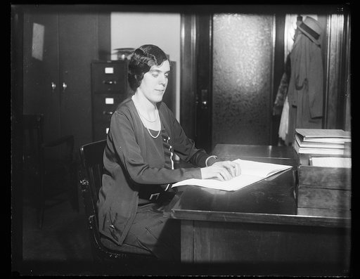 Woman reading braille