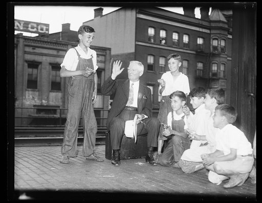 John Nance Garner on train platform with children