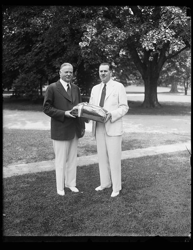 Herbert Hoover, left