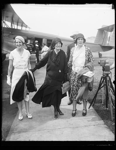 Group of women at airplane