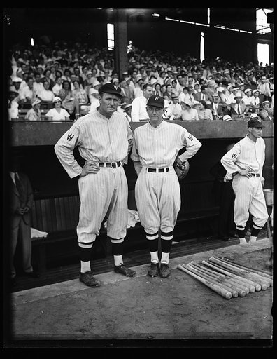 Walter Johnson, left, Washington baseball