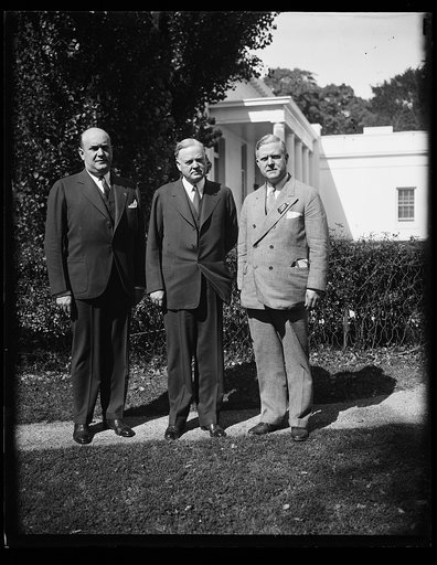 Herbert Hoover, center; outside White House, Washington, D.C.